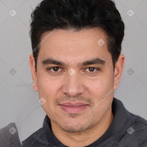 Joyful white adult male with short  black hair and brown eyes