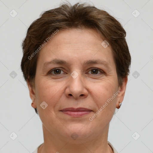 Joyful white adult female with short  brown hair and brown eyes