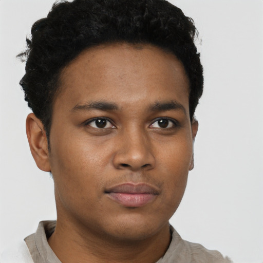 Neutral black young-adult male with short  brown hair and brown eyes