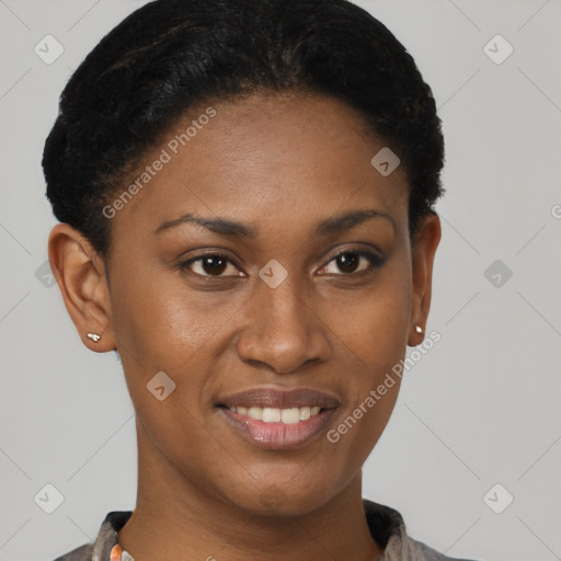 Joyful black young-adult female with short  brown hair and brown eyes