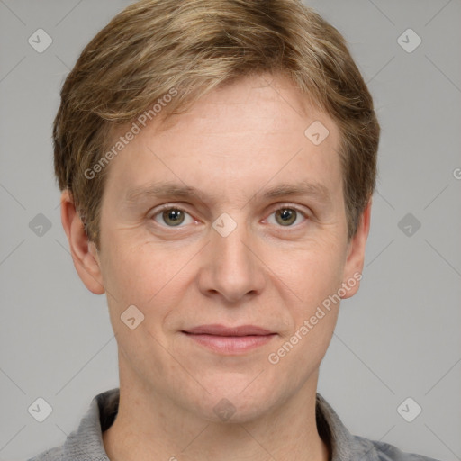 Joyful white adult male with short  brown hair and grey eyes