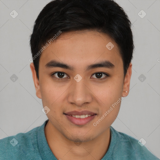 Joyful asian young-adult male with short  brown hair and brown eyes