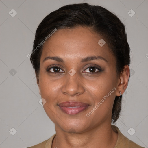 Joyful black young-adult female with medium  brown hair and brown eyes