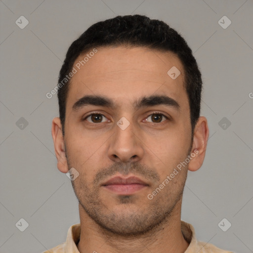 Neutral latino young-adult male with short  black hair and brown eyes