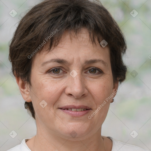 Joyful white adult female with short  brown hair and brown eyes