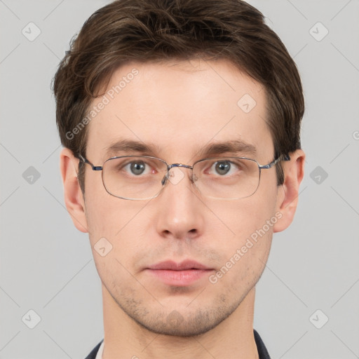 Neutral white young-adult male with short  brown hair and grey eyes