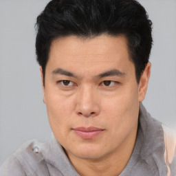 Neutral asian young-adult male with short  black hair and brown eyes