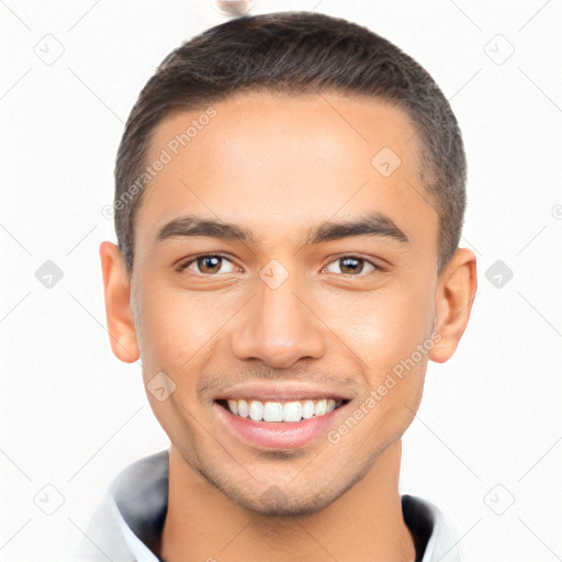 Joyful latino young-adult male with short  brown hair and brown eyes