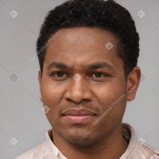 Joyful latino adult male with short  black hair and brown eyes