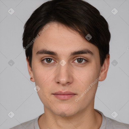 Neutral white young-adult male with short  brown hair and brown eyes