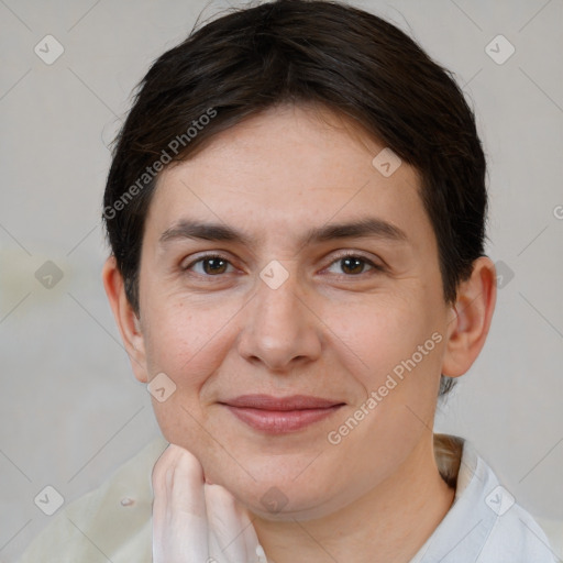 Joyful white young-adult female with short  brown hair and brown eyes