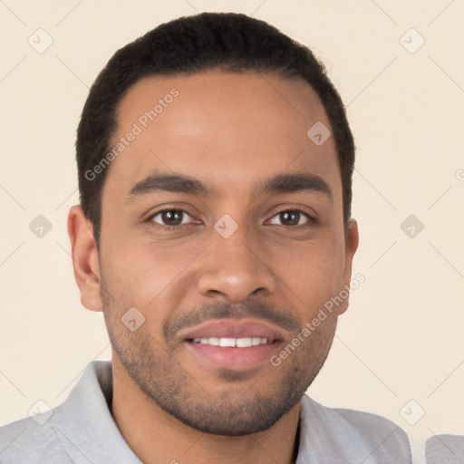 Joyful white young-adult male with short  black hair and brown eyes