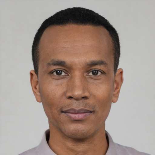 Neutral black adult male with short  black hair and brown eyes