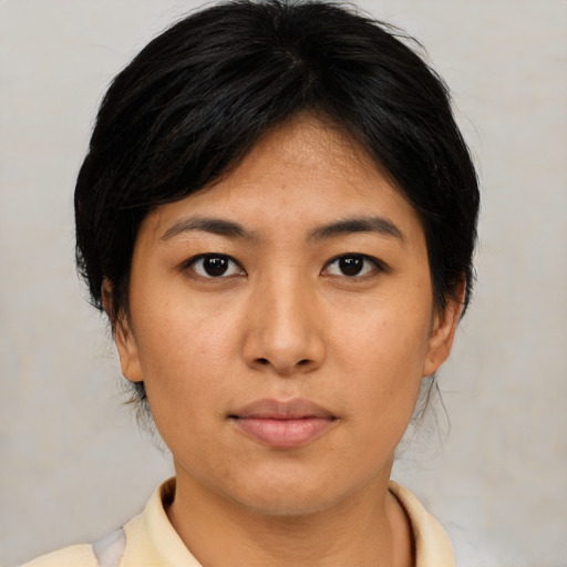 Neutral asian young-adult female with medium  black hair and brown eyes
