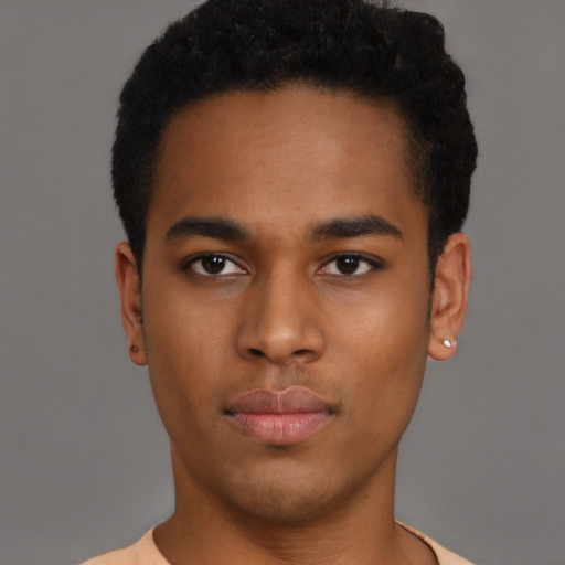 Neutral black young-adult male with short  brown hair and brown eyes