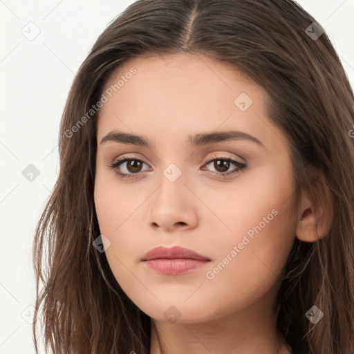 Neutral white young-adult female with long  brown hair and brown eyes