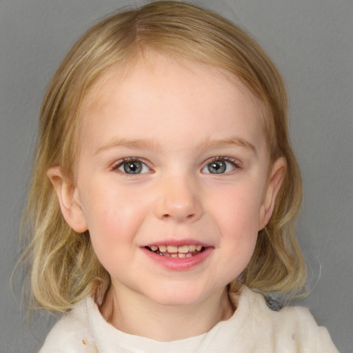 Joyful white child female with medium  brown hair and blue eyes