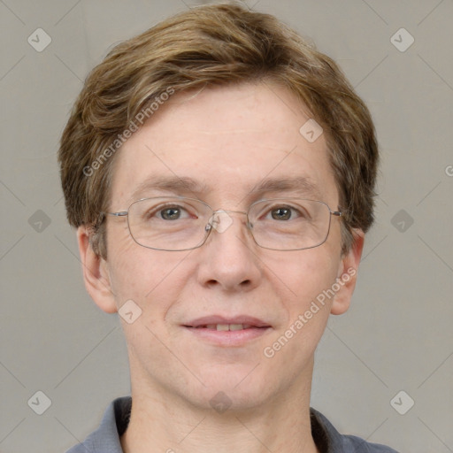 Joyful white adult male with short  brown hair and grey eyes