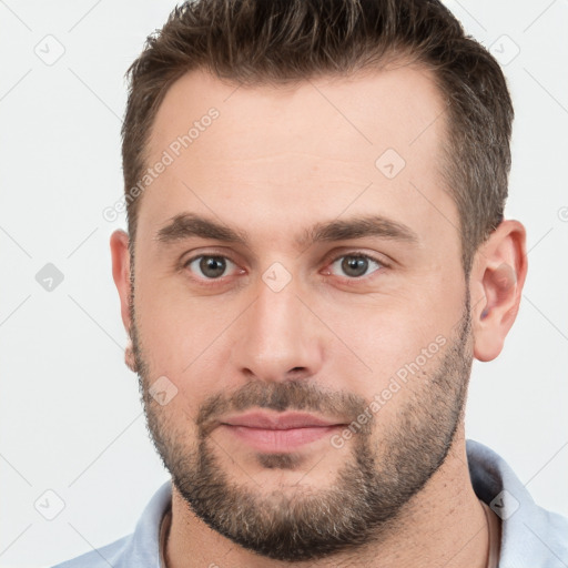 Neutral white young-adult male with short  brown hair and brown eyes