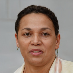 Joyful white adult female with short  brown hair and brown eyes