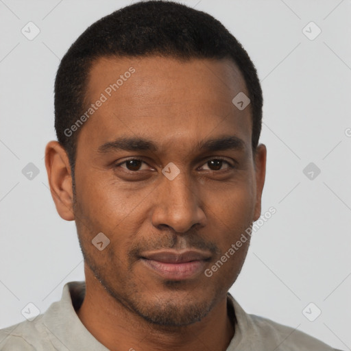 Joyful black young-adult male with short  brown hair and brown eyes