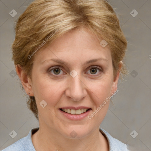 Joyful white adult female with medium  brown hair and grey eyes