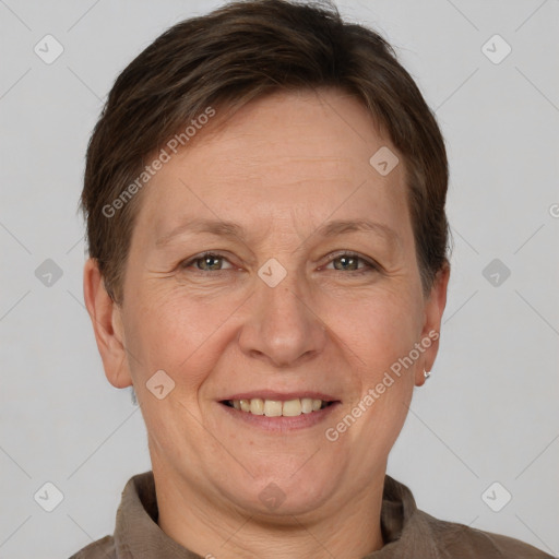 Joyful white adult female with short  brown hair and brown eyes