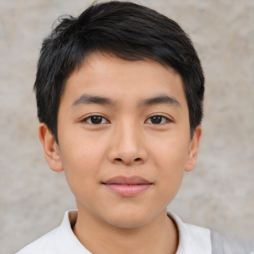 Joyful latino young-adult male with short  brown hair and brown eyes