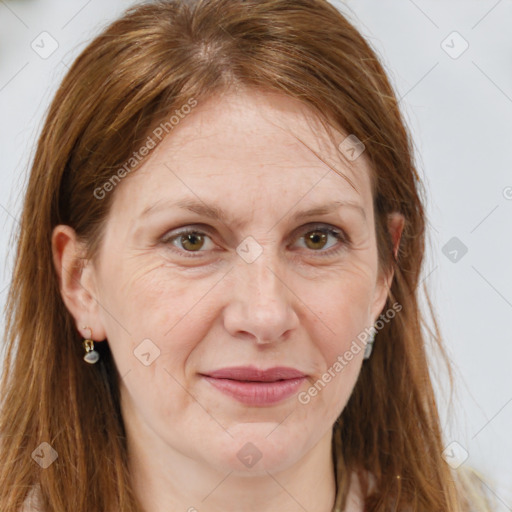 Joyful white adult female with long  brown hair and grey eyes