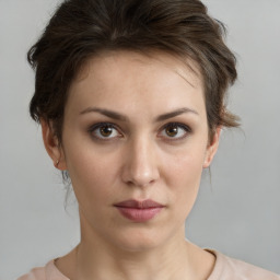 Neutral white young-adult female with short  brown hair and brown eyes