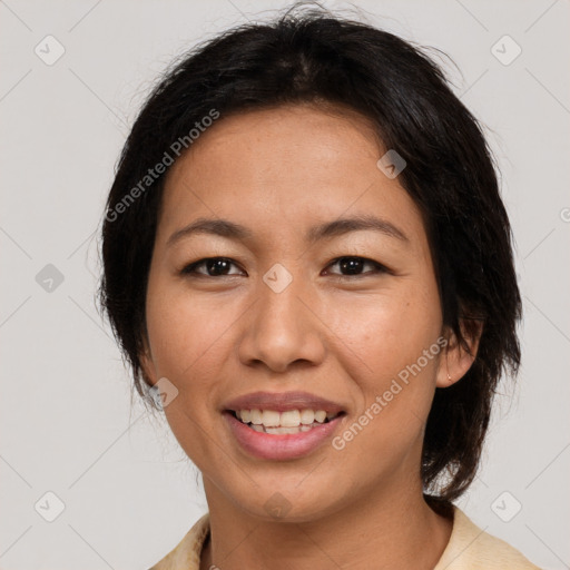 Joyful white adult female with medium  brown hair and brown eyes