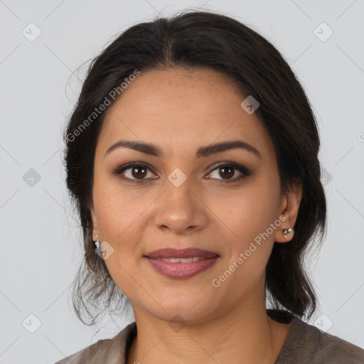 Joyful latino young-adult female with medium  brown hair and brown eyes