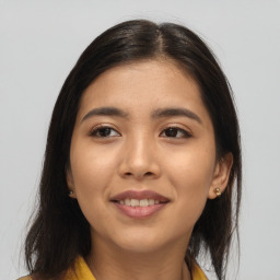 Joyful asian young-adult female with medium  brown hair and brown eyes