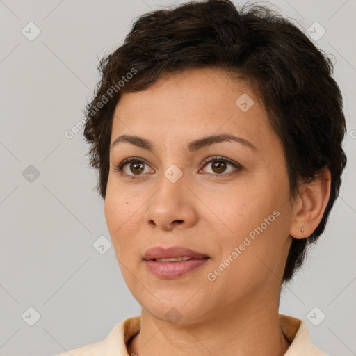 Joyful white adult female with short  brown hair and brown eyes