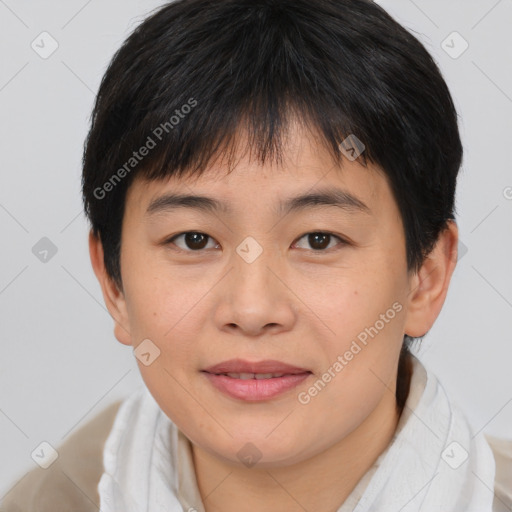 Joyful asian young-adult female with short  brown hair and brown eyes