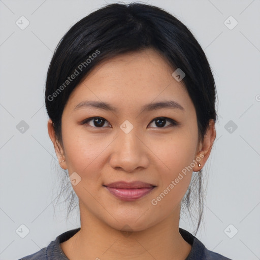 Joyful latino young-adult female with medium  black hair and brown eyes