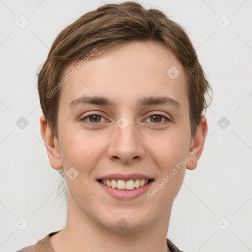 Joyful white young-adult female with short  brown hair and grey eyes