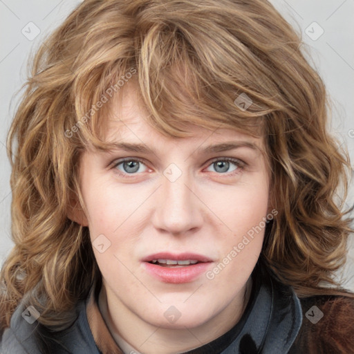 Joyful white young-adult female with medium  brown hair and blue eyes