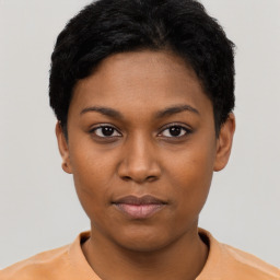 Neutral black young-adult female with short  black hair and brown eyes