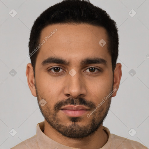 Neutral latino young-adult male with short  black hair and brown eyes