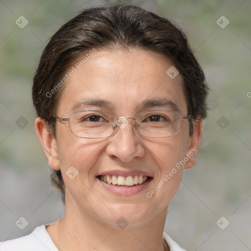 Joyful white adult female with short  brown hair and brown eyes