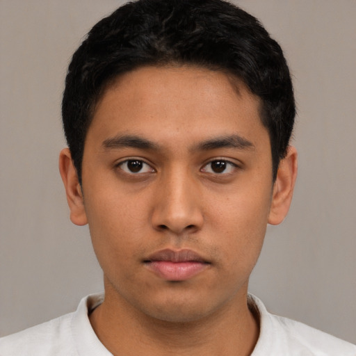 Neutral asian young-adult male with short  black hair and brown eyes