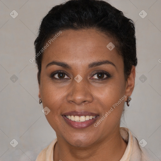 Joyful black young-adult female with short  brown hair and brown eyes