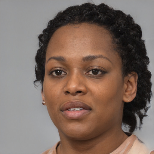 Neutral black young-adult female with medium  black hair and brown eyes