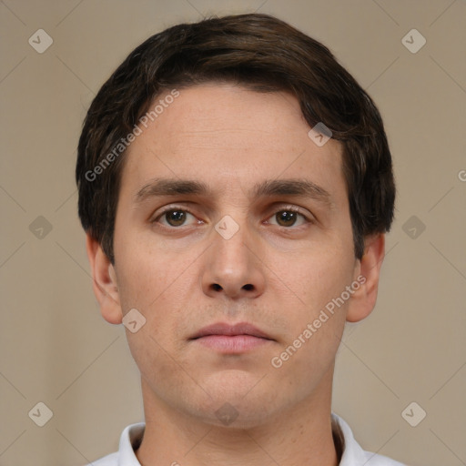 Neutral white young-adult male with short  brown hair and brown eyes