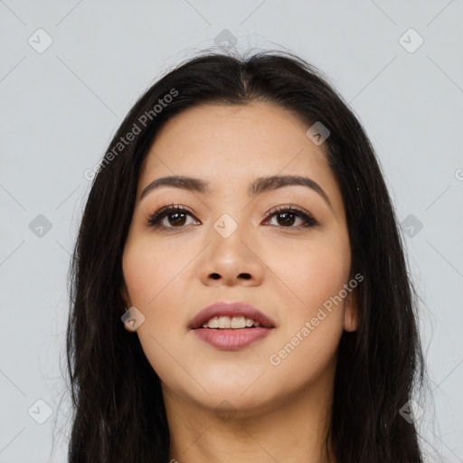 Joyful asian young-adult female with long  black hair and brown eyes