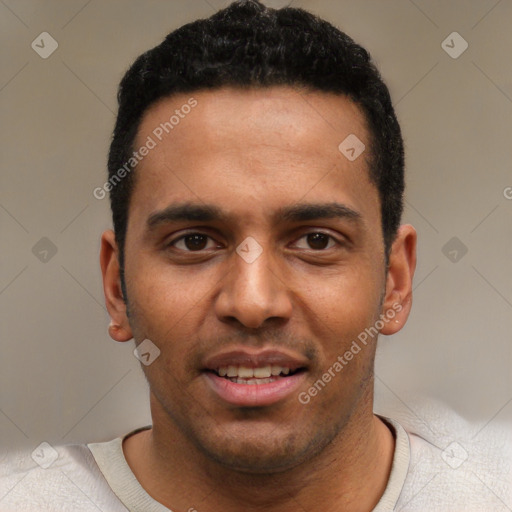 Joyful black young-adult male with short  black hair and brown eyes