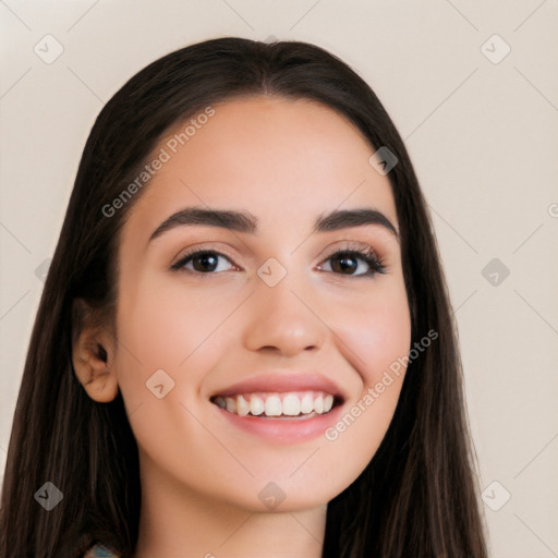 Joyful white young-adult female with long  black hair and brown eyes