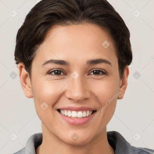 Joyful white young-adult female with short  brown hair and brown eyes