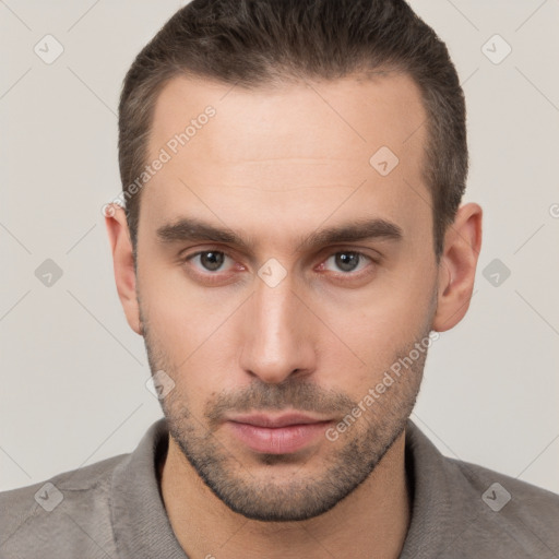 Neutral white young-adult male with short  brown hair and brown eyes